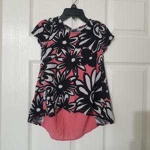 Peach with black and white flowers top